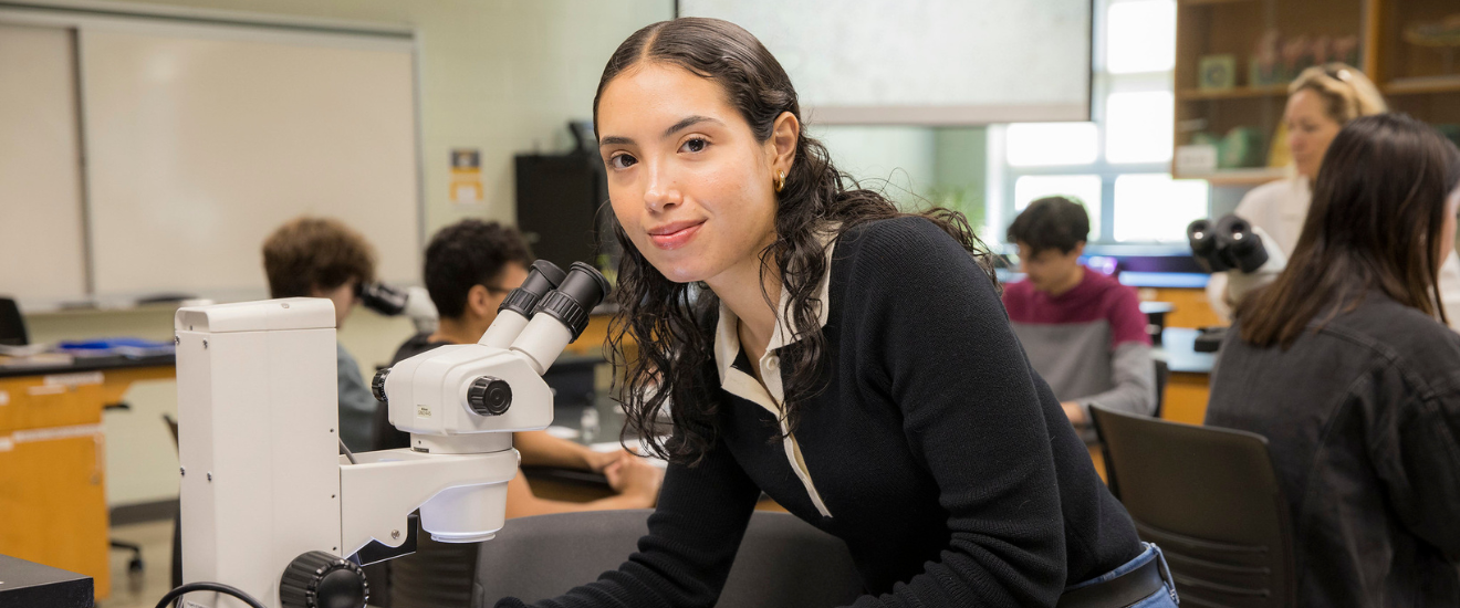 Student with microscope